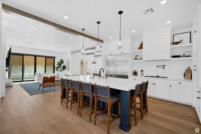 5466 S Persian Ln, St George, UT 84790 - kitchen featuring beam ceiling, built in fridge, light hardwood / wood-style flooring, and hanging light fixtures