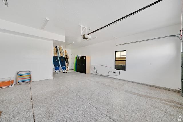 5466 S Persian Ln, St George, UT 84790 - garage featuring a garage door opener
