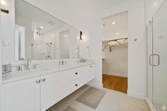 5466 S Persian Ln, St George, UT 84790 - bathroom with tile patterned flooring, vanity, and walk in shower
