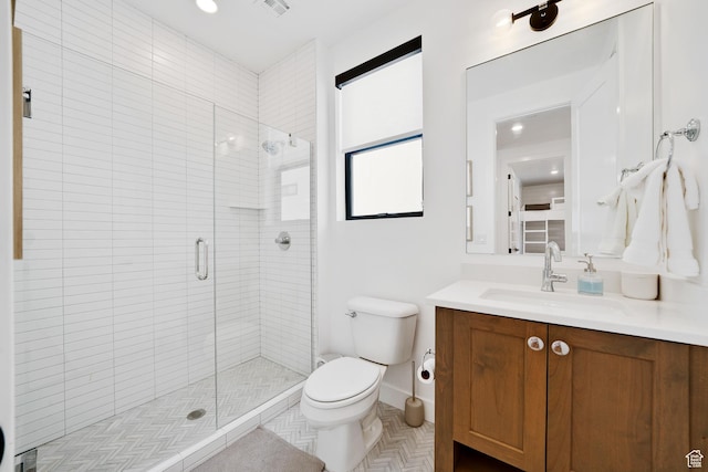 5466 S Persian Ln, St George, UT 84790 - bathroom with vanity, toilet, and an enclosed shower