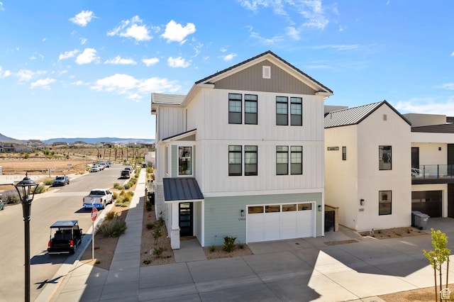 5466 S Persian Ln, St George, UT 84790 - view of front of property with a mountain view and a garage