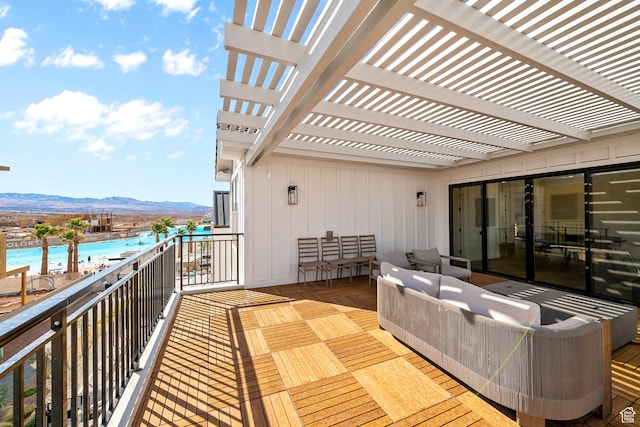 5466 S Persian Ln, St George, UT 84790 - balcony with a pergola, an outdoor living space, and a water and mountain view