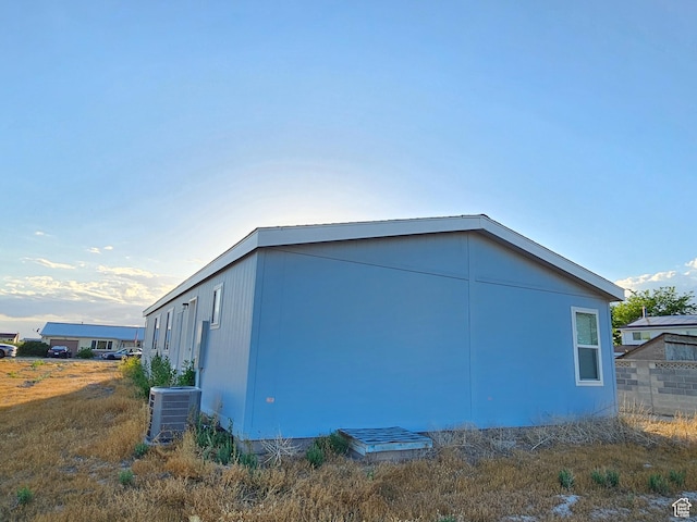 view of side of property featuring cooling unit