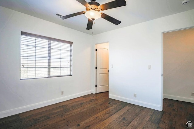 unfurnished bedroom with dark wood-type flooring and ceiling fan