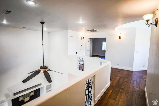hall featuring dark wood-type flooring