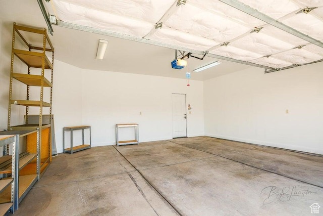 garage featuring a garage door opener