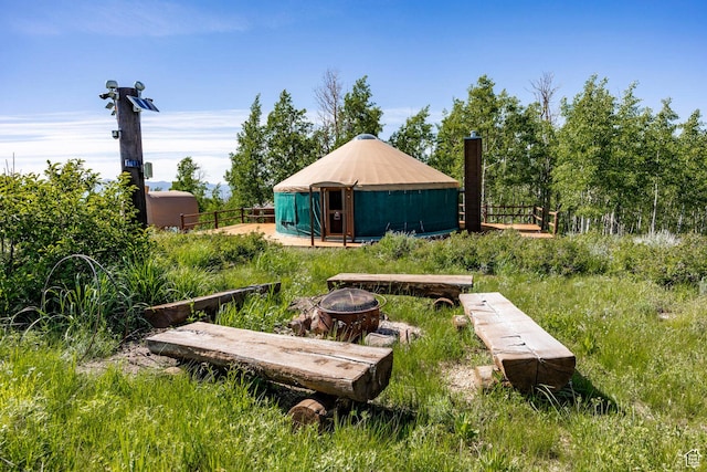 10454 E Forest Creek Rd, Kamas, UT 84036 - view of yard featuring an outdoor fire pit, fence, and an outdoor structure