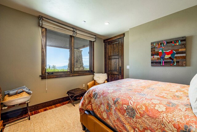 10454 E Forest Creek Rd, Kamas, UT 84036 - bedroom with baseboards and wood finished floors