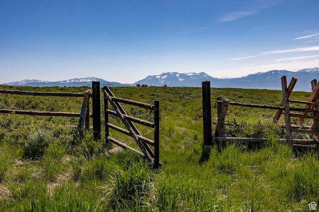 10454 E Forest Creek Rd, Kamas, UT 84036 - view of gate featuring a rural view, a mountain view, and fence