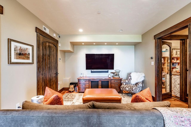 10454 E Forest Creek Rd, Kamas, UT 84036 - living area featuring wood finished floors, baseboards, visible vents, and recessed lighting