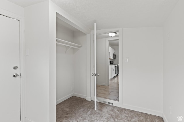 closet featuring visible vents