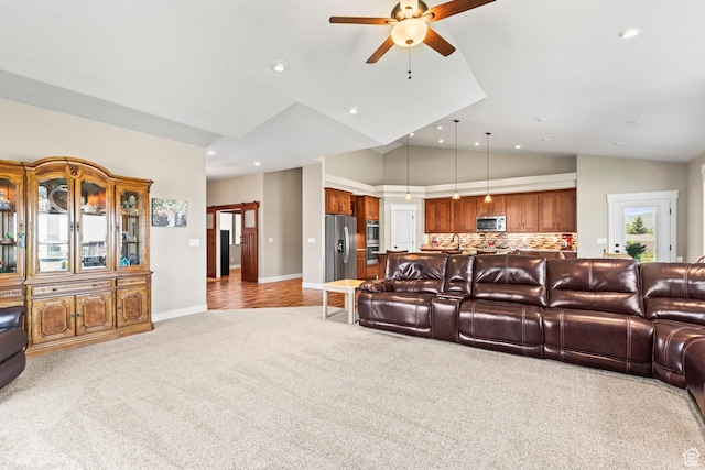 84 W 2100 N, Kamas, UT 84036 - living area with light carpet, baseboards, lofted ceiling, ceiling fan, and recessed lighting