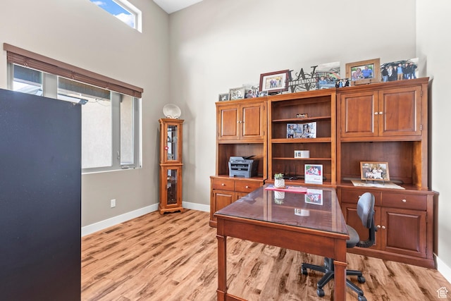 84 W 2100 N, Kamas, UT 84036 - office area with baseboards, a towering ceiling, and light wood-style floors