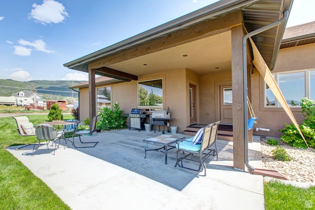 84 W 2100 N, Kamas, UT 84036 - view of patio featuring entry steps, a grill, and a mountain view