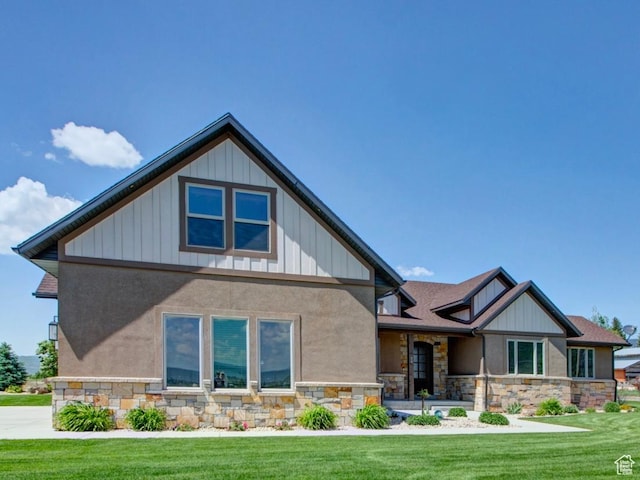 84 W 2100 N, Kamas, UT 84036 - craftsman-style home featuring board and batten siding, a front yard, and stone siding