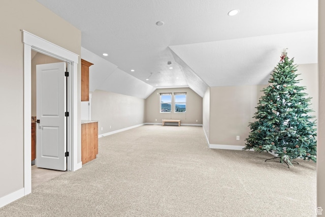 84 W 2100 N, Kamas, UT 84036 - bonus room with vaulted ceiling, recessed lighting, baseboards, and light colored carpet