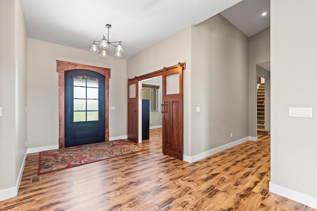 84 W 2100 N, Kamas, UT 84036 - foyer entrance with wood finished floors, baseboards, and a barn door