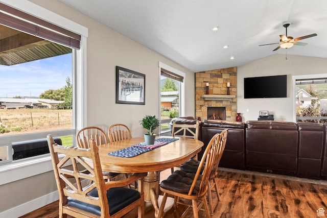 84 W 2100 N, Kamas, UT 84036 - dining area with dark wood-style flooring, a fireplace, vaulted ceiling, ceiling fan, and baseboards