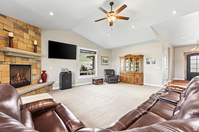 84 W 2100 N, Kamas, UT 84036 - living area with carpet, a ceiling fan, vaulted ceiling, a stone fireplace, and baseboards