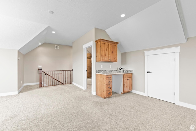 84 W 2100 N, Kamas, UT 84036 - kitchen with light carpet, baseboards, vaulted ceiling, and light countertops