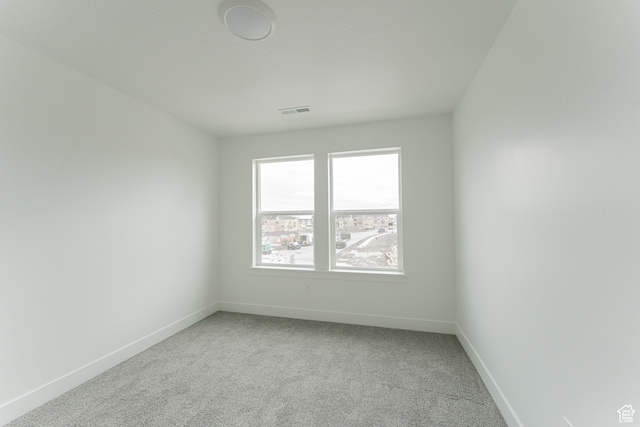 empty room with light carpet