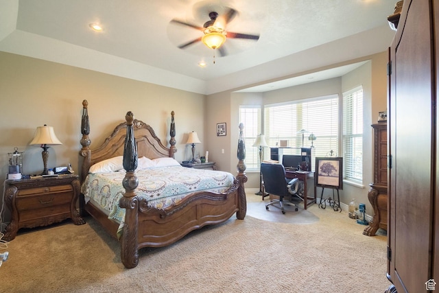 carpeted bedroom featuring baseboards, recessed lighting, and ceiling fan