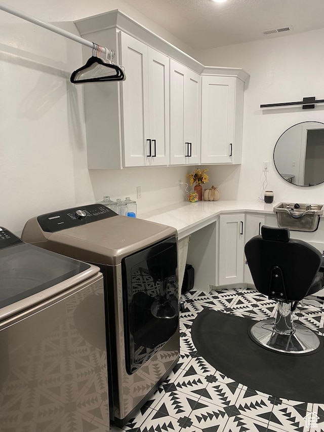 40 E 200 N, Castle Dale, UT 84513 - clothes washing area featuring cabinets and independent washer and dryer