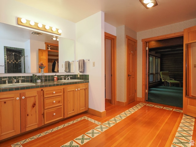 2718 E Stewart Rd, Sundance, UT 84604 - bathroom with hardwood / wood-style flooring, double sink, and oversized vanity