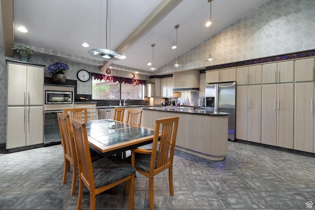dining space featuring recessed lighting, lofted ceiling, and wine cooler