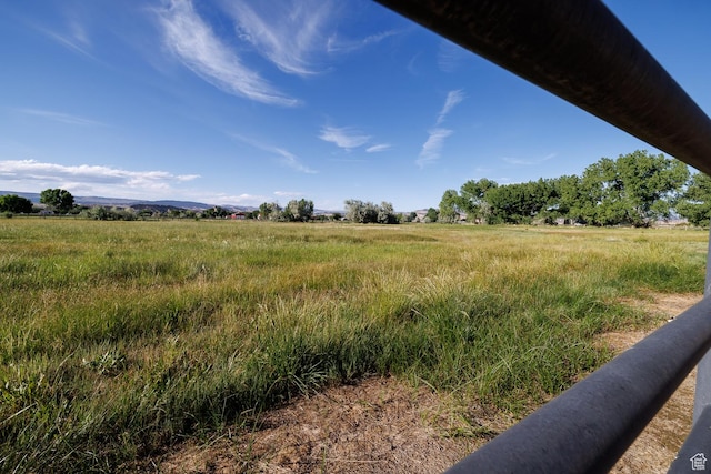 exterior space with a rural view