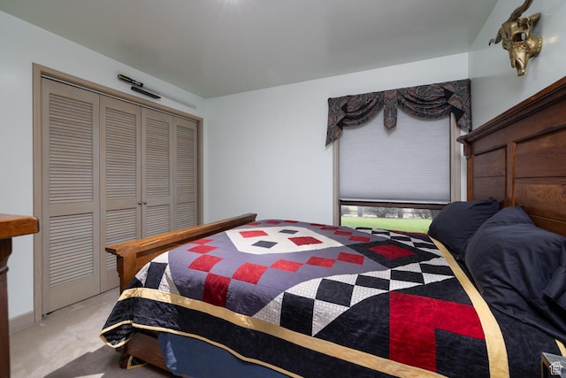 carpeted bedroom with a closet