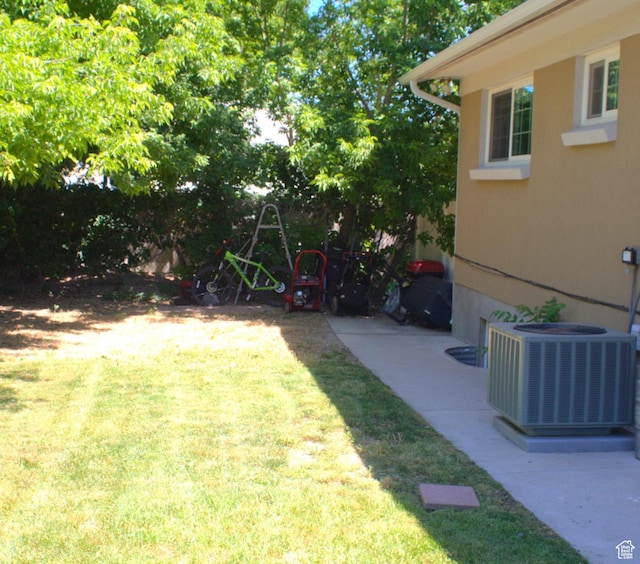 7642 S 2700 W, West Jordan, UT 84084 - view of yard featuring central air condition unit