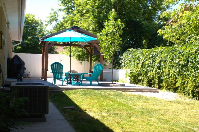 7642 S 2700 W, West Jordan, UT 84084 - view of yard with central AC and a patio area