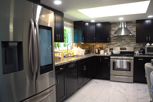 7642 S 2700 W, West Jordan, UT 84084 - kitchen featuring decorative backsplash, appliances with stainless steel finishes, a skylight, wall chimney exhaust hood, and sink