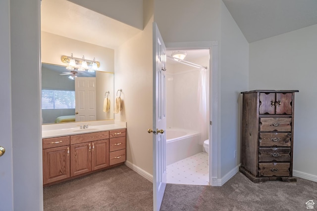 full bathroom featuring vanity, ceiling fan, independent shower and bath, toilet, and lofted ceiling