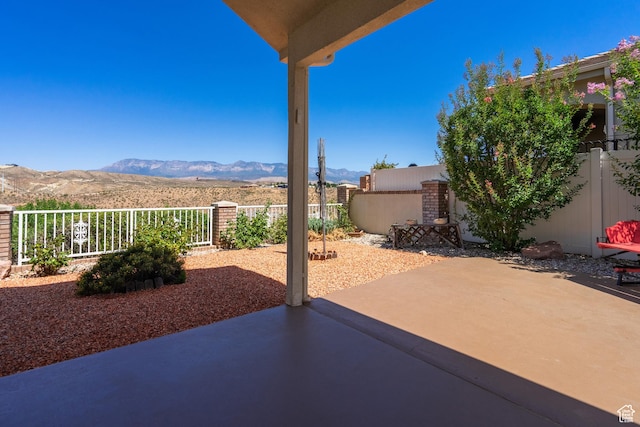 view of patio with a mountain view