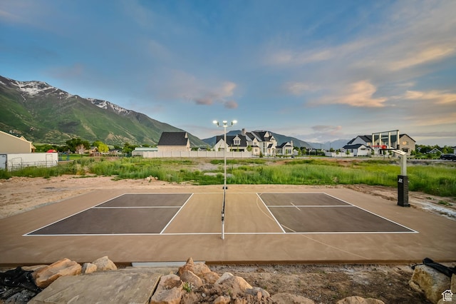 213 W 250 S Unit 15, Mapleton, UT 84664 - view of sport court featuring basketball hoop, a mountain view, and a residential view