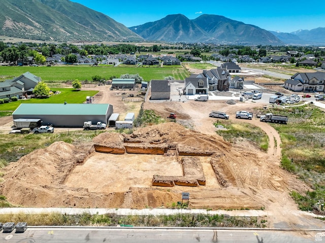 aerial view with a mountain view and a residential view