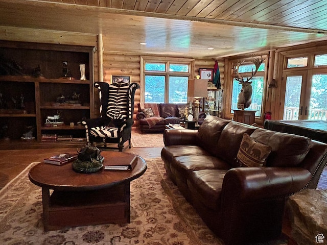 303 Rachel Ln S, New Harmony, UT 84757 - living room with wood ceiling, a wealth of natural light, and log walls