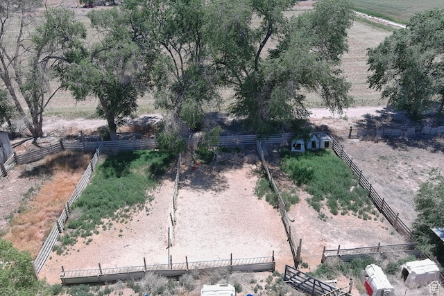 birds eye view of property featuring a rural view