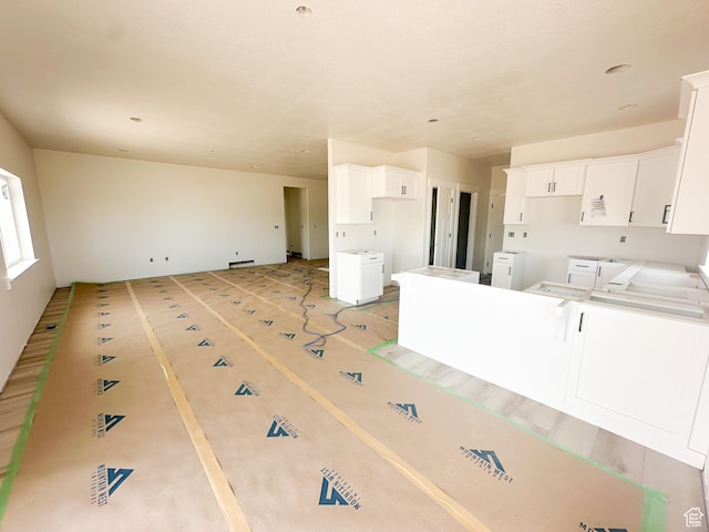 kitchen with white cabinets
