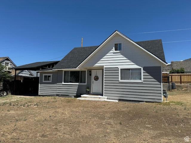 339 Berkley Ave, East Carbon, UT 84520 - view of front of property with roof with shingles and fence