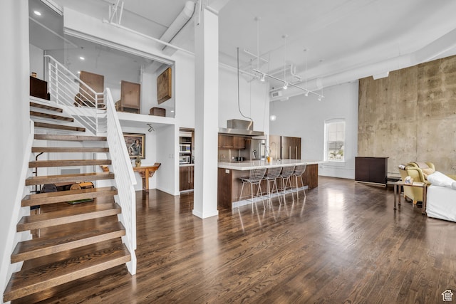 159 W Broadway Unit 301, Salt Lake City, UT 84101 - interior space with dark wood-type flooring and a high ceiling