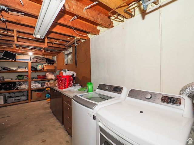 laundry room with washer and clothes dryer