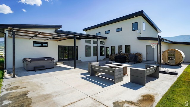 1245 E Draper Ln, Wallsburg, UT 84082 - back of house featuring a patio area and a hot tub