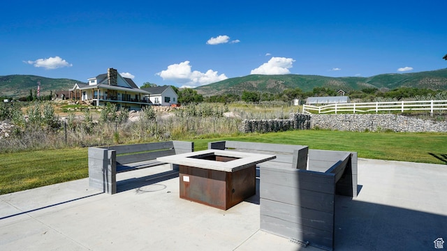 1245 E Draper Ln, Wallsburg, UT 84082 - view of patio / terrace with a mountain view and an outdoor fire pit
