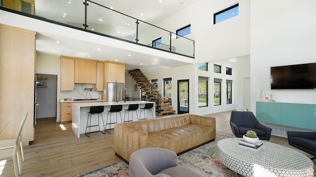 1245 E Draper Ln, Wallsburg, UT 84082 - living room with a high ceiling and light hardwood / wood-style floors