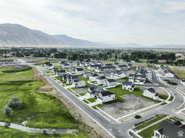 drone / aerial view featuring a mountain view