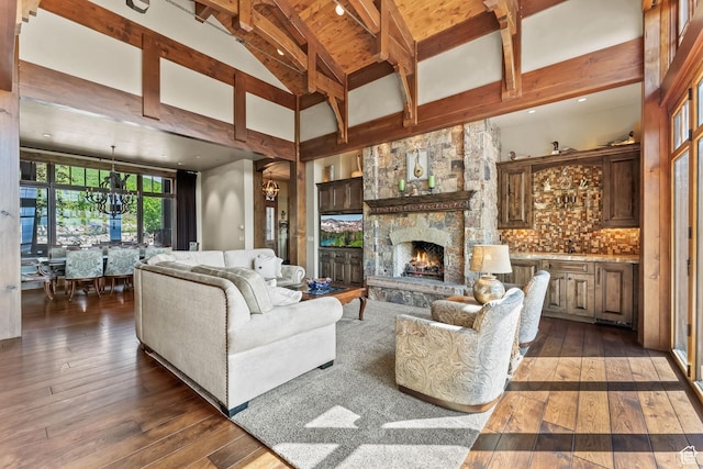 1355 W Red Hawk Trl Unit 35, Park City, UT 84098 - living room with high vaulted ceiling, a fireplace, beam ceiling, and hardwood / wood-style floors