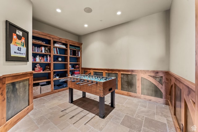 1355 W Red Hawk Trl Unit 35, Park City, UT 84098 - playroom with a wainscoted wall, recessed lighting, and stone tile floors